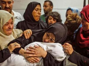 The mother of Layla Ghandour, a Palestinian baby of eight months who died during Monday’s violence in Gaza. (AFP/ File)