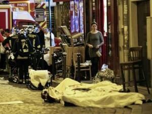 Victims of the November 13 Paris attacks are covered in white sheets after being declared dead at the scene. (AFP/File)