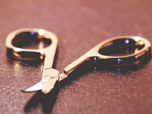 The accused picked up a pair of scissors and stabbed his brother several times on the right side of his head, causing severe bleeding, and eventual death.