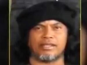 A member of the Philippines-based Abu Sayyaf militant group is seen in a file photo. The group is responsible for kidnapping foreigners and for numerous militant attacks in the Philippines. (File Photo)