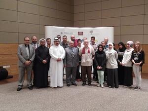 Mr Thomas Altman, an expert on laser and light activities, with members of the audience from the ‘Ibn Al-Haytham Days’ event. 
