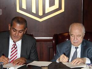 Dr. Talal Abu-Ghazaleh (R) and Dr. Youssef Fanous, Pharmacy One Group CEO, during the signing ceremony. 