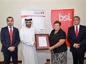 Al Janahi receiving the certificate