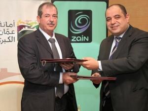 Ahmad Hanandeh, CEO Zain Jordan and Chairman of Amman Municipality Committee Engineer AbdulHaleem AlKilany signed the agreement