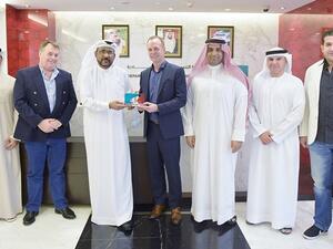 Ali Ibrahim with Nike representatives