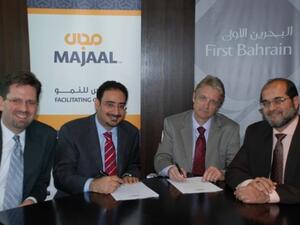 Amin Al Arrayed, General Manager of First Bahrain; Mr. Peter Makepeace, General Manager of Baker Wilkins &amp;amp; Smith Middle East; Daniel Taylor Head of Operations First Bahrain; and Yasser Abu-Lughod Head of Development First Bahrain