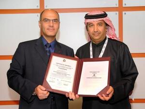 Mohammed Saleh Badri, ESMA Acting Director General awards the Emirates Quality Mark to Mr. Mehrdad Yousefi, Managing Director of Superpipe International