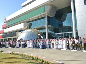 Raising the UAE flag from half-mast in front of Dubai Customs main building  