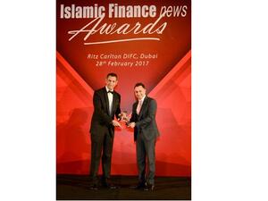 Dr. Adnan Chilwan, Group CEO at Dubai Islamic Bank, receiving IFN Awards