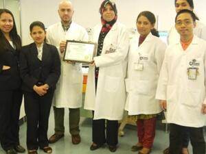 Dr. Ibtisam Al Obaid with her team