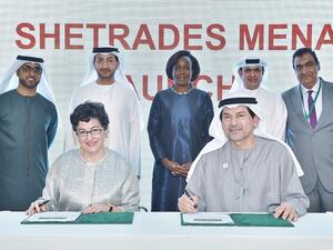 Sami Al Qamzi, Director General of DED, and Arancha González, Executive Director of the International Trade Centre with representatives during the signing ceremony.