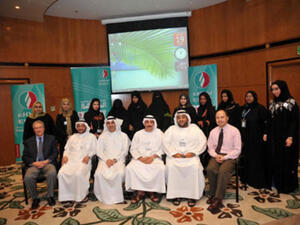The trainees with members from ENOC management during the graduation ceremony 