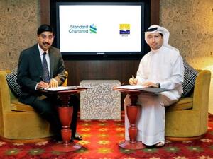 Arif Amiri, Chief Executive Officer, Emaar Retail and Pramod Veturi, Acting Head of Consumer Banking, Standard Chartered Bank UAE during the signing ceremony