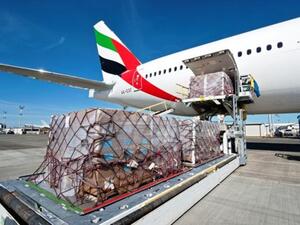 Emirates Airlines' Boeing 777-300 is loaded with relief supplies for victims of the Somalia civil war