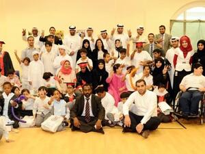 Daman's Thiqa employees with ZHO students and staff