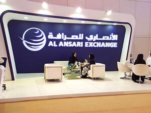 Mohammad Ali Al Ansari, Al Ansari Exchange Managing Director receiving the award 