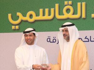 Obaid Al Shamsi, Chief of Human Resources & Admin at DIB, receives the award