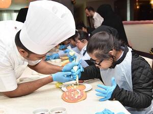 During their visit, the 20 children from Shafallah Center for Persons with Disabilities, learned cookie making class from the hotel’s team members at the Teatro restaurant.