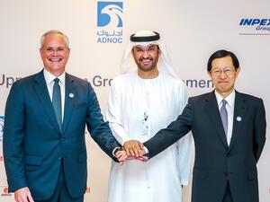 Sultan Ahmed Al Jaber, UAE Minister of State and Group CEO of ADNOC, with Darren W. Woods, Chairman and Chief Executive Officer of Exxon Mobil Corporation and Toshiaki Kitamura, President and Chief Executive Officer of INPEX, after the signing ceremony.