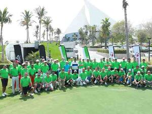 James Voce and Parvez Merchant, Winners of the first qualifying round of XCGC 2015 lift the trophy at Dubai Creek Golf and Yacht Club, Dubai