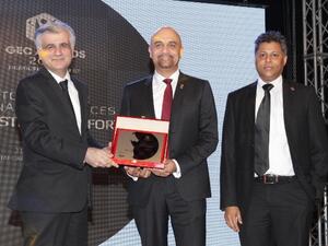 Yasser Zeineldin, CEO, eHosting DataFort (center) receiving the Top Managed Service Provider of the Year