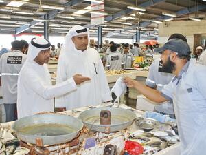 Market visits are aimed to strengthen communication and partnership with the merchants in enhancing consumer confidence.
