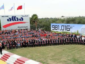 Alba management, directors and staff celebrate the record.