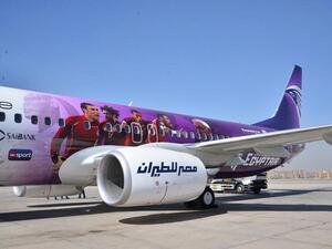 The plane, designed by EgyptAir, bears the image of the flag of Egypt and pictures of the players of the national football team. (EgyptAir)