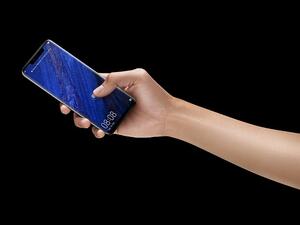 The in-screen fingerprint scanner works in one particular spot that lights up when needed. 