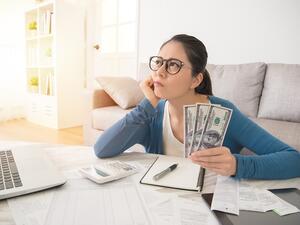 Spending money increases as you progress in life. Here's how to determine your priorities and boost your income, step by step. (Shutterstock)