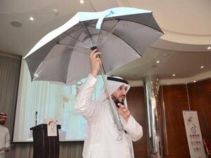 The “Mecca Umbrella” with its inventor. (SG)