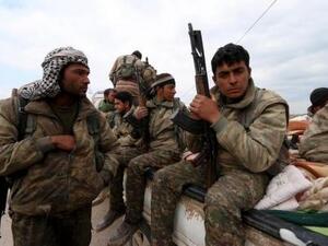 مقاتلون من وحدات حماية الشعب الكردية في القامشلي
