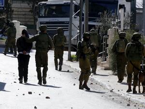 During clashes with Palestinians at the Al-Amari refugee camp (AFP/File Photo) During clashes with Palestinians at the Al-Amari refugee camp (AFP/File Photo)