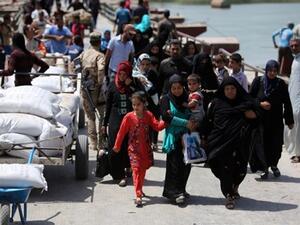Displaced people from Ramadi arrive in Baghdad.  (AFP/File)