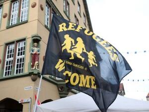 A flag reading "Refugees Welcome" is seen at a demonstration in Villingen-Schwenningen, southern Germany, on January 30, 2016. (AFP/File)