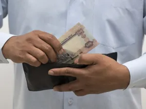 According to a report by Oxford Economics, salaries in the UAE are likely to face pressures on higher living costs, including the introduction of VAT. (File photo)