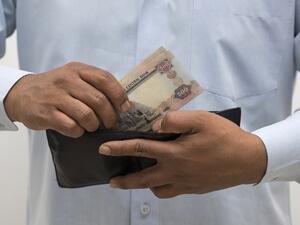 According to a report by Oxford Economics, salaries in the UAE are likely to face pressures on higher living costs, including the introduction of VAT. (File photo)