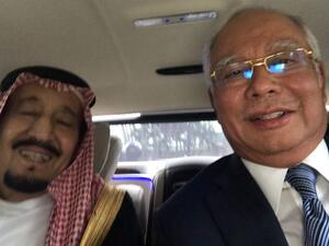 الملك سلمان مع رئيس وزراء ماليزيا 