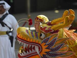 A Chinese traditional dance troupe performs at the inauguration ceremony of the Yanbu Aramco Sinopec Refining Company Project in Riyadh on January 20, 2016. (AFP/ Fayez Nureldine)