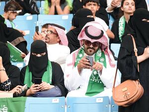 Last month, women were invited with their families to a sports stadium for the first time to attend annual National Day celebrations (AFP/File)
