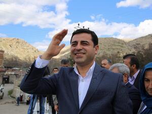 Co-leader of the pro-Kurdish Peoples' Democratic Party (HDP) Selahattin Demirtas waving as Kurds gather for Noruz celebrations in Diyarbakir, southeastern Turkey. Demirtas criticised the German government's dealings with the Turkish government on April 12, 2016. (AFP/File)
