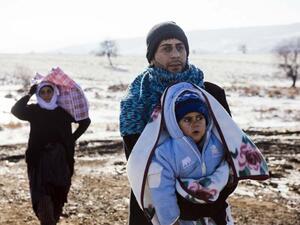 A refugee family crossing through Serbia. (AFP/Dimitar Dilkoff)