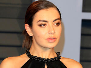 Charli XCX apologised to her fans after suffering a boob slip opening for Taylor Swift in Glendale, Arizona, last night  (Source: Kathy Hutchins / Shutterstock)