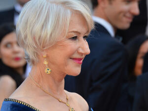 The Oscar winning actress Helen Mirren looked sensational on the outing as she slipped into a medieval inspired velvet gown with winged sleeves (Source: Featureflash Photo Agency / Shutterstock)