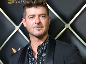 Thicke and his pregnant girlfriend April Love Geary were evacuated from their Malibu abode (Source: lev radin - Shutterstock.) Thicke and his pregnant girlfriend April Love Geary were evacuated from their Malibu abode (Source: lev radin - Shutterstock.)