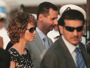 Bashar al-Assad (C), president of Syria, and his wife Asma al-Assad (L) (Shutterstock)