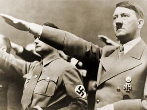 Adolf Hitler, giving Nazi salute (Shutterstock)