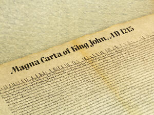 Magna Carta Libertatum, is an eight-hundred year-old English legal charter that required King John of England to proclaim certain rights and accept that his will could be bound by the law. (Shutterstock)