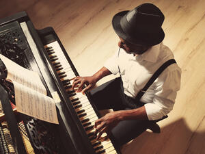 Man on Piano. (Shutterstock/ File Photo)