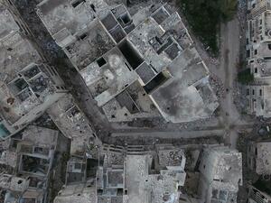 Many believe the military has intentionally targeted civilian buildings to help implement a controversial urban planning scheme called “Homs Dream” (Shutterstock/File)
